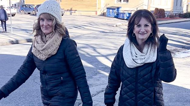 Sandy and Eileen of the United Way walk in for the Heart of Hunger Challenge